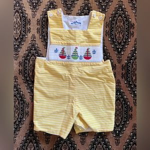 The sweetest and playful Jon Jon! Love the sailboats!